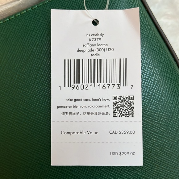 Green Kate Spade purse, brand new with tags and packaging, small blemish. - Picture 6 of 6